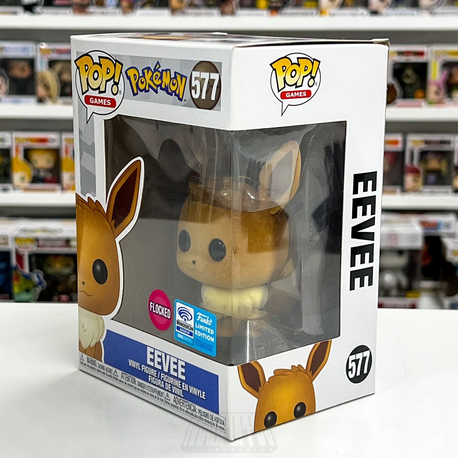 Funko Pop Games Pokemon Eevee Flocked WonderCon 577 Official Sticker TCG Figure1